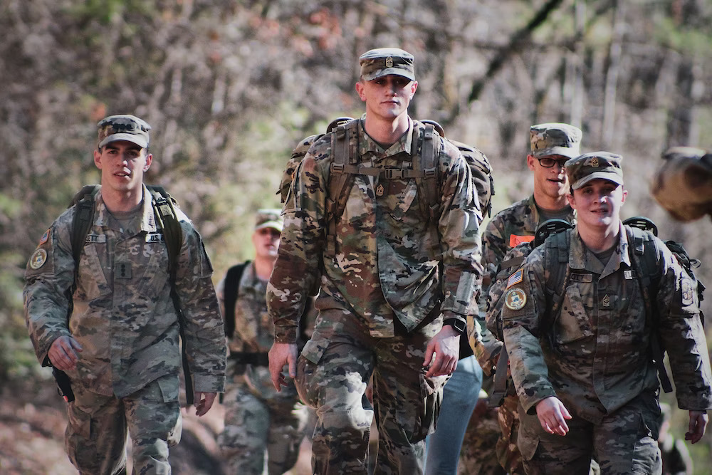 men in camouflage uniform