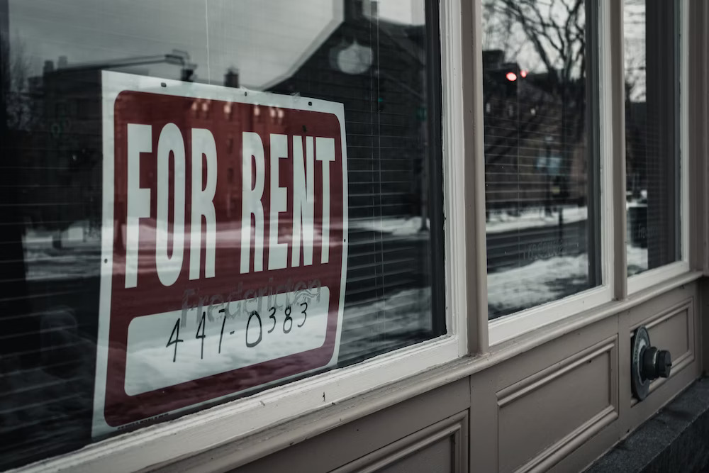 for rent board visible from a window