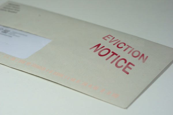 An envelope with "EVICTION NOTICE" written on it.
